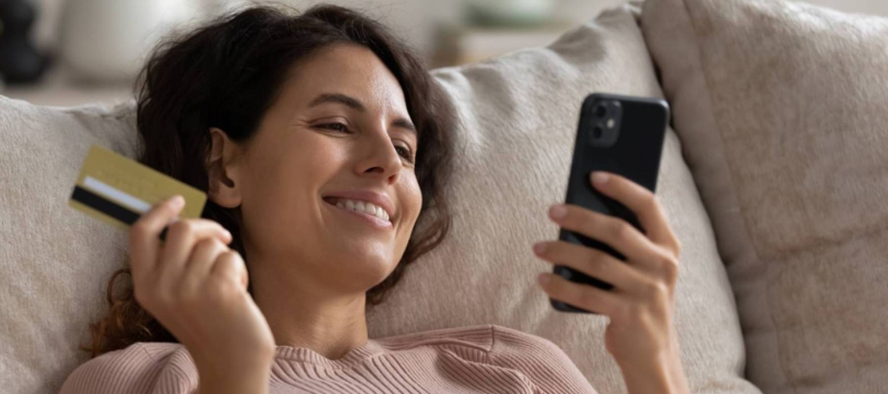Woman holding credit card