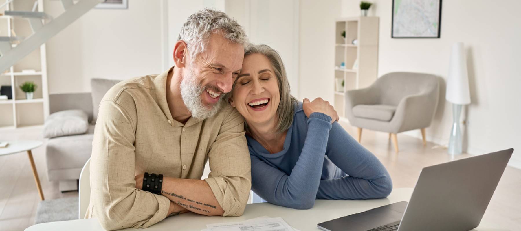 Couple looking at their investments