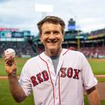 Robert Herjavec of Shark Tank poses for a photograph after throwing out a ceremonial first pitch in 2018