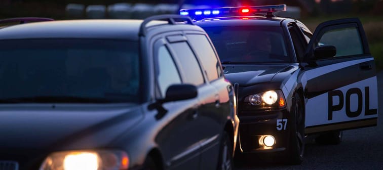 Highway Traffic Patrol Car Pulls over Vehicle on the Road for speeding