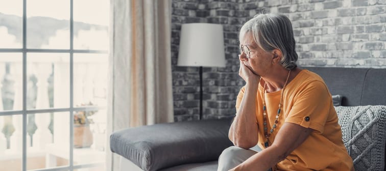 Woman looking our the window