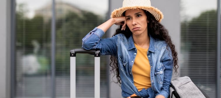 Woman traveller looking stressed