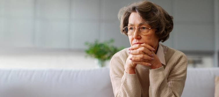 Elder lady looking pensive