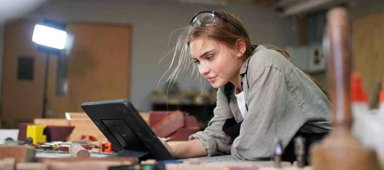 Young woman working on tablet