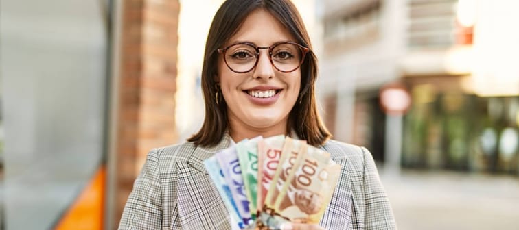 Woman holding money