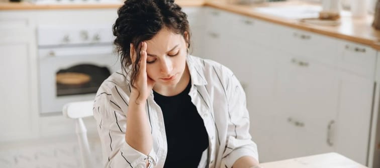 Woman figuring out her finances
